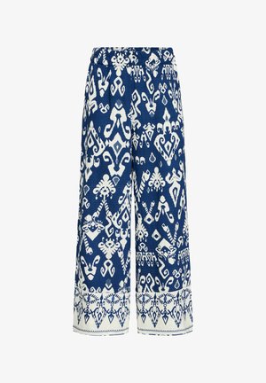 Blue and white wide-leg pants featuring a geometric pattern and an elastic waistband. Fabric appears lightweight with a smooth texture.