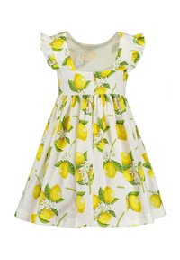 Robe en coton blanc ornée d'un motif de citrons avec des citrons jaunes et des feuilles vertes. Corsage ajusté avec des manches volantées et jupe froncée.