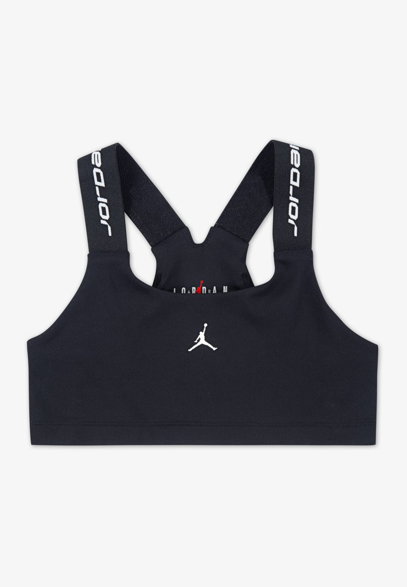 Melnā sporta krūšturis ar platām siksnām, kurā attēlots baltais "Jordan" logos. Gluda auduma, bez stieples, paredzēts aktīvai lietošanai.