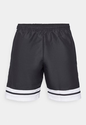 Μαύρα αθλητικά σορτς με ελαστική μέση, διακοσμημένα με λευκές οριζόντιες ρίγες στο στρίφωμα και λεία υφή.