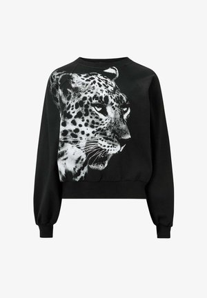 Schwarzes Sweatshirt mit einem verkürzten Design, das auf der Vorderseite ein großes weißes Leopardenmuster und gerippte Bündchen aufweist. Weicher Stoff.