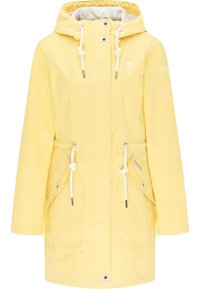 Imperméable à capuche jaune avec cordons blancs, fermeture par boutons et zip à l'avant, deux poches frontales avec rabats, et petit logo parapluie sur la poitrine.