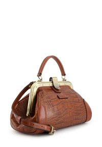 Brown leather handbag with a crocodile texture, rounded shape, brass hardware, and a top handle. Includes a detachable shoulder strap.