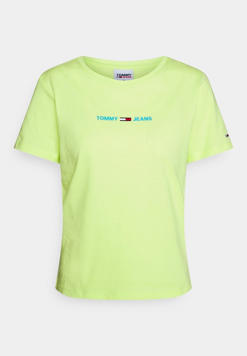 Neongrön bomull t-shirt med rund halsringning, korta ärmar och "TOMMY JEANS"-logotyp i blått med röda och vita accentlinjer.