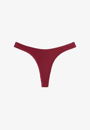 Piros, méhsejt mintás, texturált bikini alsó. Minimális tanga kialakítással és vékony oldalszíjakkal.