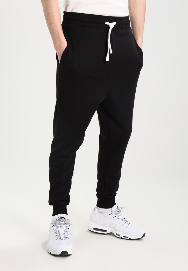 Produkt Träningsbyxor - black