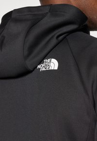 The North Face REAXION HOODED FULL ZIP JACKET - Športna jakna/jopica - black heather