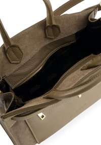 Olive green leather tote bag with suede accents, zippered compartment, smooth interior lining, and square gold hardware detail.