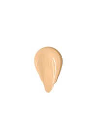 Fondotinta in tonalità beige chiaro, texture liscia, con forma a goccia, finitura lucida e leggere venature. Presentazione minimalista.