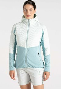 Leichte Jacke in Hellblau, mit einer gesteppten Textur im oberen Bereich und glattem Stoff darunter. Mit Reißverschlusstaschen an den Seiten.