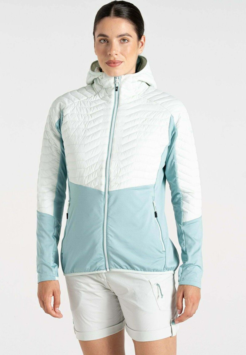 Leichte Jacke in Hellblau, mit einer gesteppten Textur im oberen Bereich und glattem Stoff darunter. Mit Reißverschlusstaschen an den Seiten.