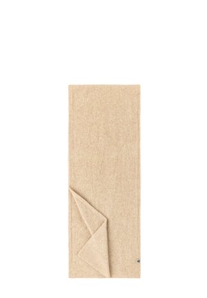 Beige strukturierter rechteckiger Schal mit einer leicht gefalteten Ecke, die weichen Strickstoff und ein kleines gewebtes Etikett am Rand zeigt.