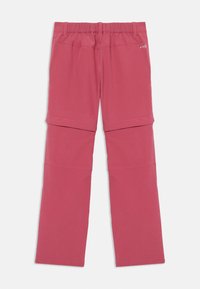Pantalons de plein air roses en tissu léger et extensible. Dotés d'une taille élastique, de jambes droites et d'ouvertures zippées au niveau des genoux.