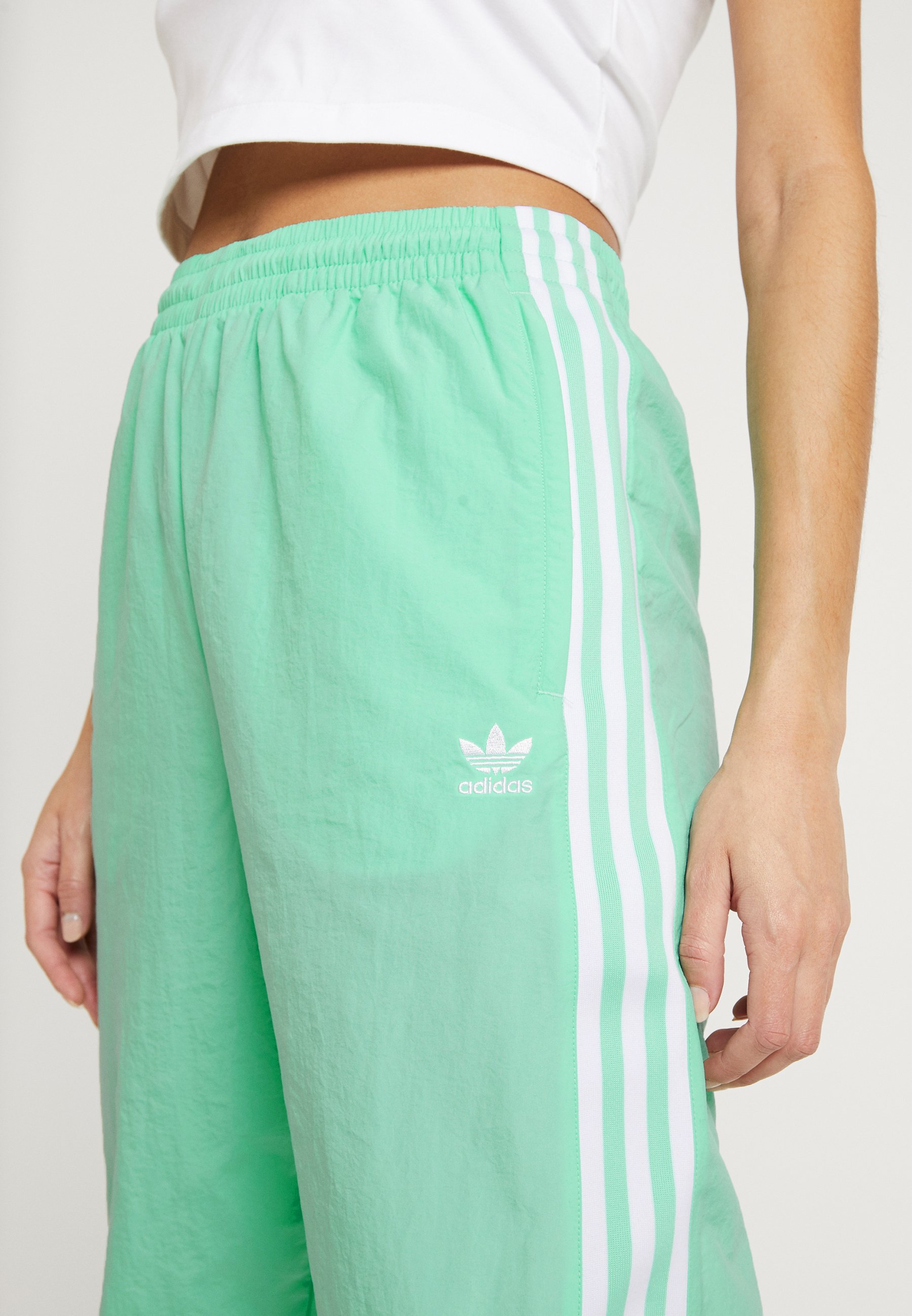 LOCK UP ADICOLOR NYLON TRACK PANTS - Pantalon de survêtement - prism mint/white LOCK UP ADICOLOR NYLON TRACK PANTS - Pantalon de survêtement - prism mint/white