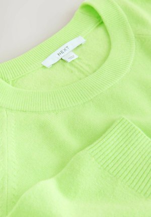 Neongrøn sweater lavet af blødt strikket stof med en ribstrikket rund halsudskæring og detaljer på ærmerne, mærket "NEXT."