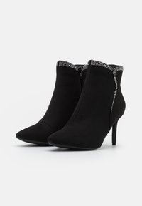 Menbur Botines bajos - black