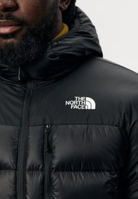 The North Face Bunda z prachového peří - black