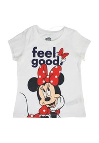 T-shirt en coton blanc arborant un graphique d'un personnage de dessin animé avec un nœud rouge, texte "feel good" en violet, manches courtes, encolure ronde.