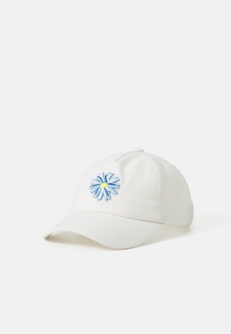White cotton baseball cap featuring an embroidered blue flower with a yellow center on the front. Curved brim and stitched detailing.