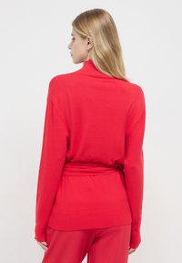 Calliope Strickpullover - rosso