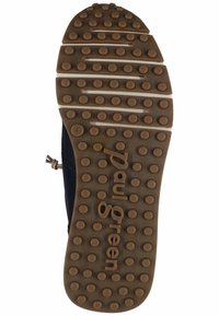 Gumowa podeszwa buta z teksturowanym gripem, z okrągłymi wgłębieniami i logo "Paul Green". Kolor: brązowy z jasnobeżowymi akcentami i rowkami.