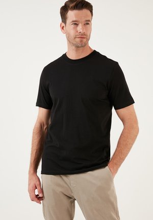 REGULAR FIT - Basic T-shirt - black