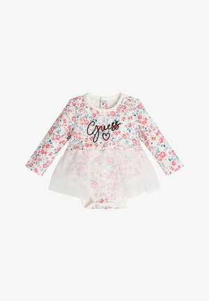 Body z długim rękawem w kwiatowy nadruk z tiulowym wykończeniem oraz czarnym tekstem "Guess" z przodu. Przeważająco biały z czerwonymi i niebieskimi kwiatami.