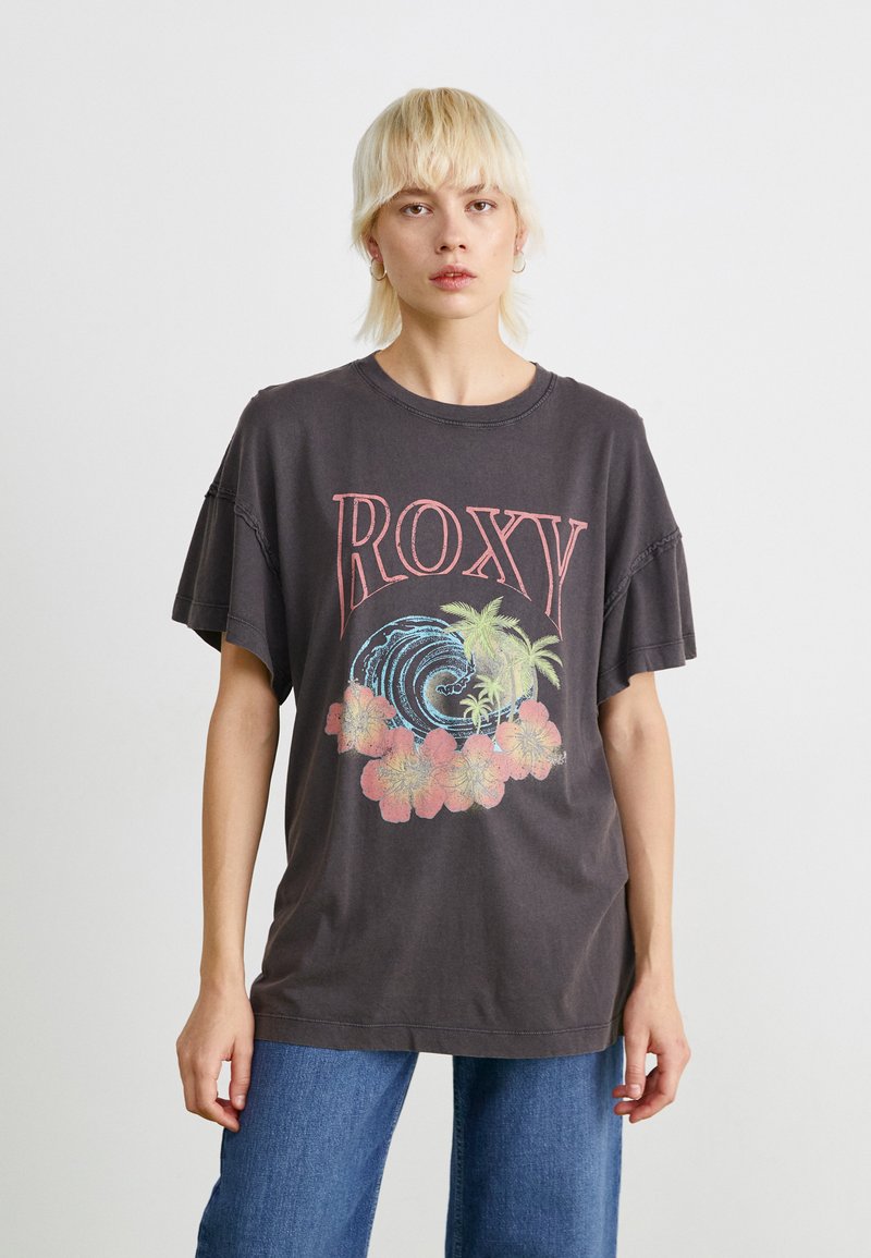 Voľný tmavosivý tričko s ružovým logom "ROXY", grafiku vĺn a kvetinové akcenty. Krátke rukávy s uvoľneným výstrihom.