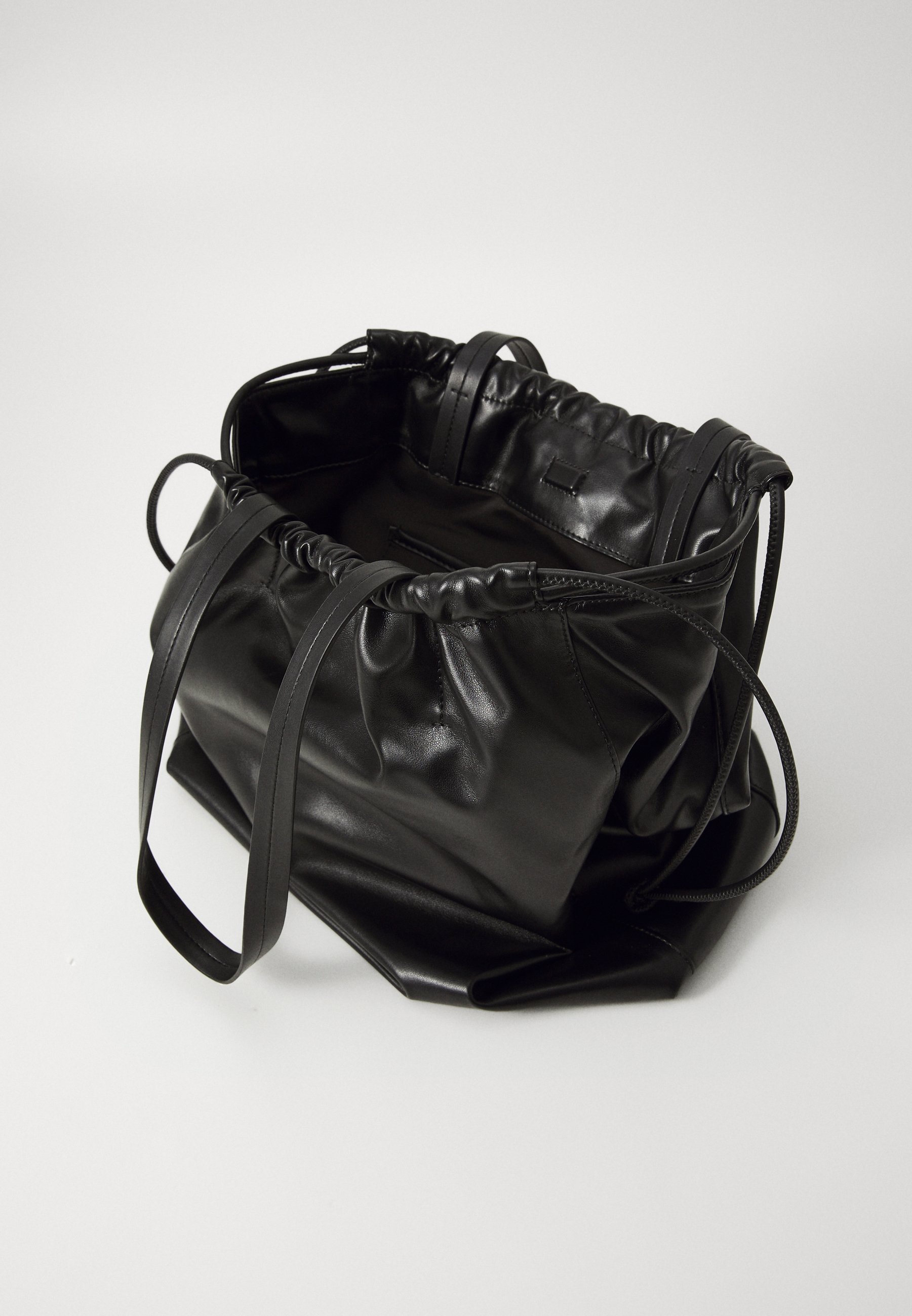 Calvin Klein Jeans DRAWSTRING TOTE - Tote bag - black