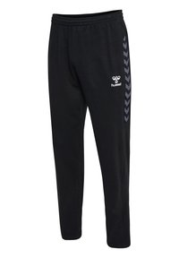 Czarne dresy wykonane z mieszanki bawełny, z elastycznym pasem, kieszeniami po bokach oraz szarym wzorem w zygzak na bokach.