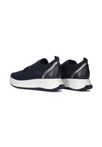Navy blue sneakers with a textured knit upper and sleek leather accents; features a thick white sole and pull tab on the heel.
