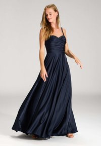 Navy-blaues, bodenlanges Kleid mit einem figurbetonten, gerafften Oberteil und bestickten Trägern. Der glatte Satinstoff sorgt für einen eleganten Fall und Fluss.
