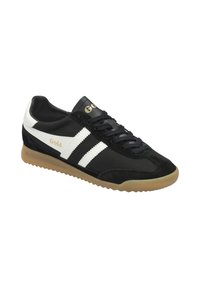 Black sneaker with white stripes and gold "Gola" logo. Made of suede and fabric, featuring a textured sole and round toe design.