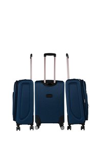 Maleta rígida azul marino con dos ruedas negras, asa retráctil de aluminio y compartimentos con cremallera; superficie texturizada con patrón de líneas.