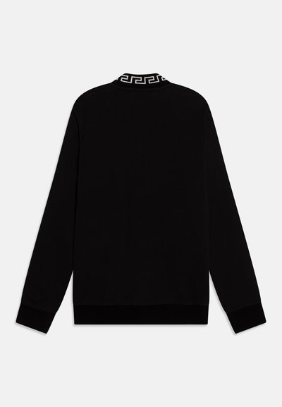 Black long-sleeve sweater featuring a patterned collar. Smooth fabric, ribbed cuffs, and hem ensure a snug fit. Minimalist design with no embellishments.