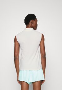 Lacoste Sport SLEEVELESS GOLF - Polotričko - blanc