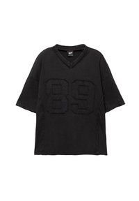 Sort oversized t-shirt med korte ærmer og v-hals, prydet med et stort broderet nummer "89" på forsiden og en struktureret finish.