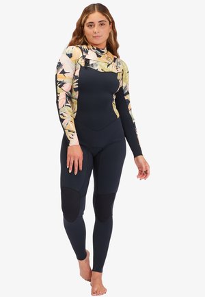Traje de neopreno con parte superior de estampado floral y parte inferior negra, hecho de material flexible. Incluye parches en las rodillas para mayor durabilidad.