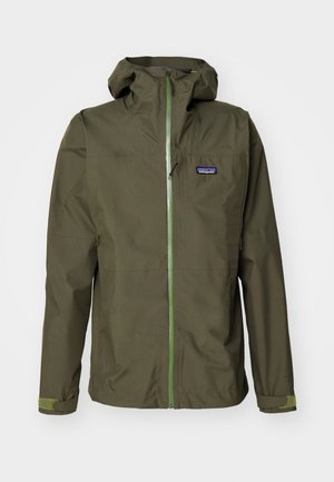 Olive green waterproof jacket with a front zipper, adjustable hood, and elastic cuffs. Features a logo patch on the left chest and contrasting green accents.