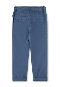 Back view of blue casual pants with elastic waistband, belt loops, two welt back pockets, and folded hems.