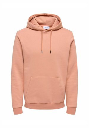 Hooded dukserica u svijetlopresnoj boji, napravljena od mekog materijala. Ima prednji kengur džep, kapu s vezicom i rebraste manžete i donji rub.