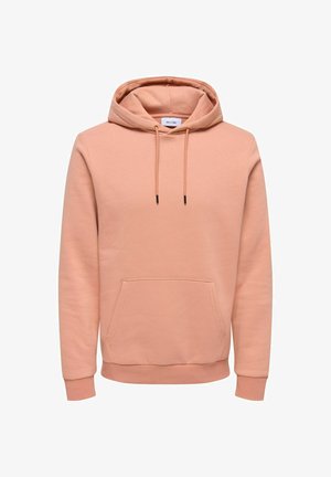 Hoodie in licht perzik, gemaakt van zachte stof. Bevat een voorzak met kangoeroe-stijl, een capuchon met trekkoord, en ribgebreide manchetten en zoom.