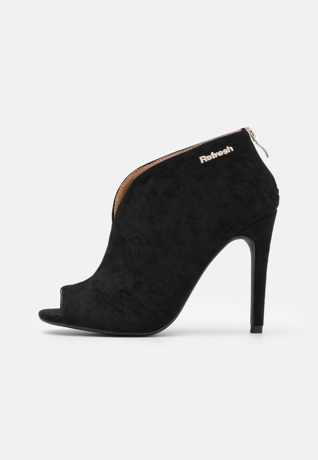 Stivaletti con tacco - black