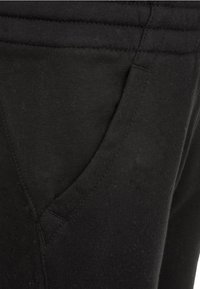 Nike Sportswear CLUB PANT - Träningsbyxor - black