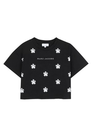 Black cropped t-shirt made of cotton, featuring white floral designs and the text "MARC JACOBS" in the center. Short sleeves, relaxed fit.
