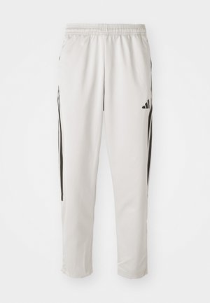 adidas Sportswear TIRO - Tracksuit bottoms - grey one/black