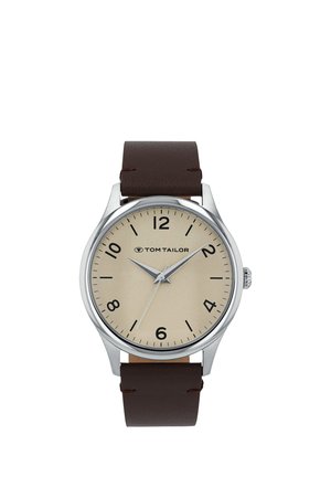 Analoge Tom Tailor Armbanduhr mit beigem Zifferblatt, schwarzen Zahlen, silbernem Gehäuse und dunkelbraunem Lederarmband, zeigt 10:10:36.