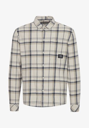 Långärmad rutiga skjorta i beige och marinblå, tillverkad av mjukt material. Har knappstängning framtill, krage och en logotyp på bröstet.