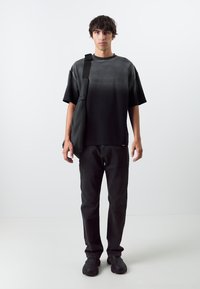 Don't Waste Culture JEFF UNISEX - Straight leg jeans - black