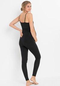 bonprix UMSTANDS - Leggings - black